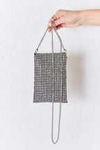 Back view of Chaos Spark Mini Rhinestone Crossbody Bag with silver chain strap